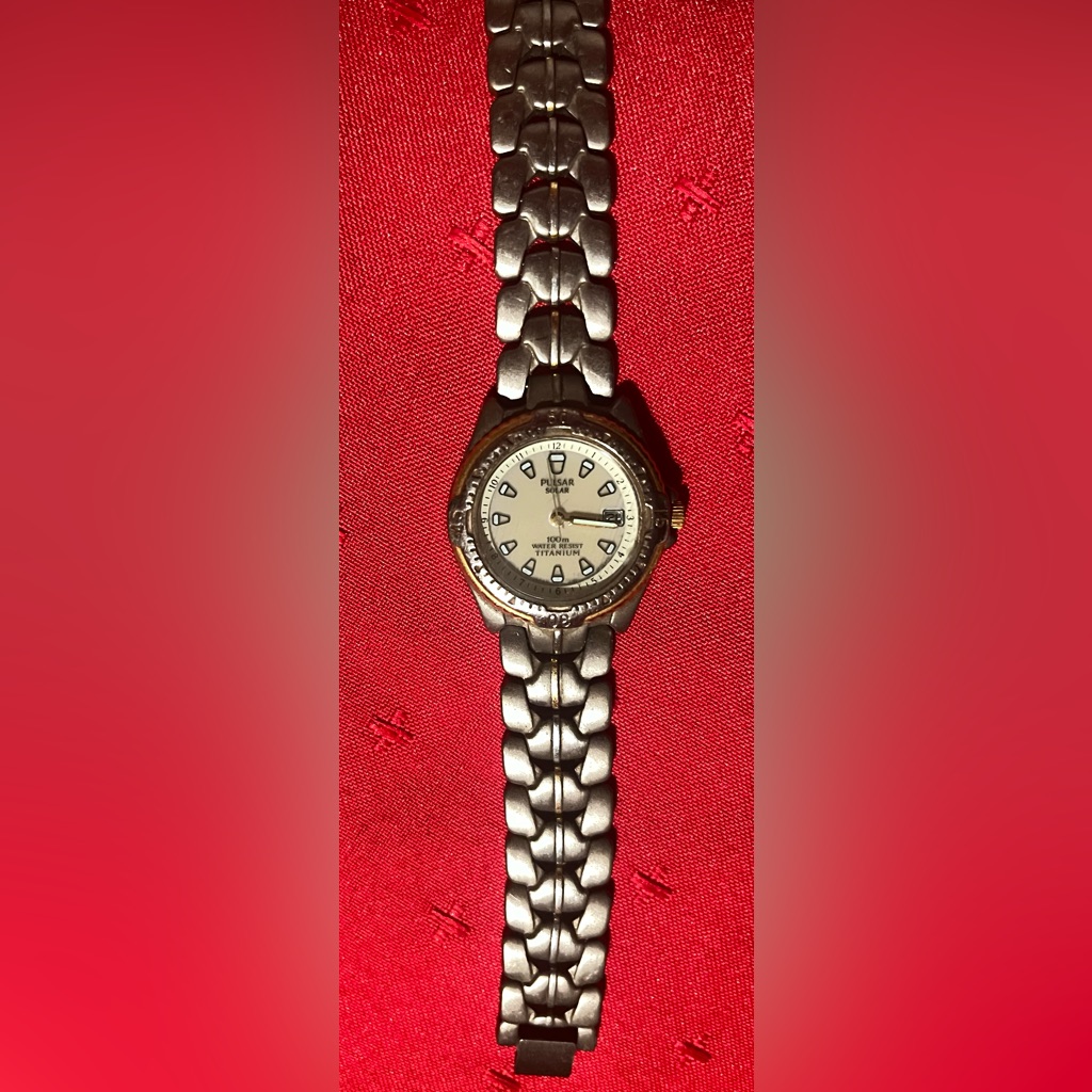 Pulsar Solar Watch With Silver And Gold Accents Pulsar Solar Watch With Silver And Gold Accents